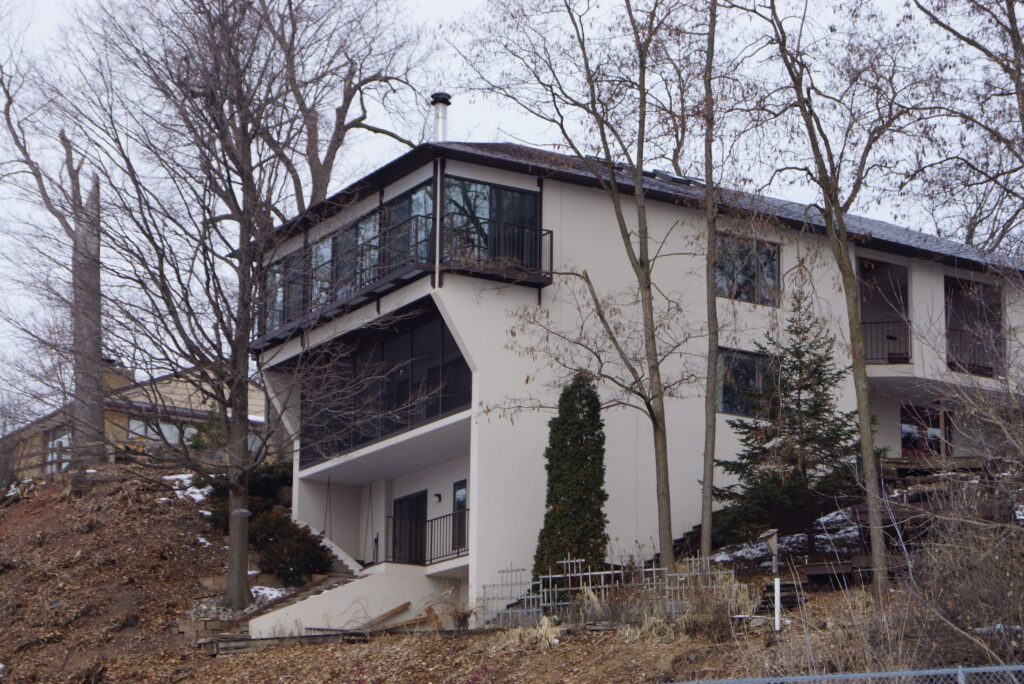 Home, tree, balcony and the sky