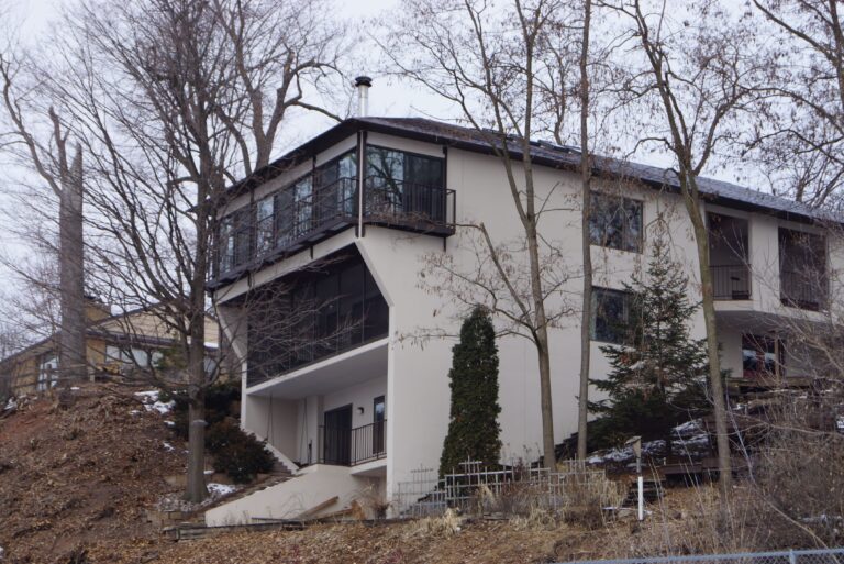 Home, tree, balcony and the sky