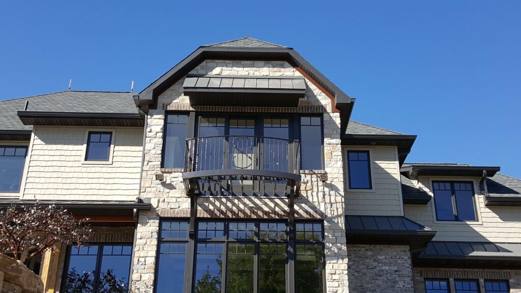 Home with grey walls and a balcony