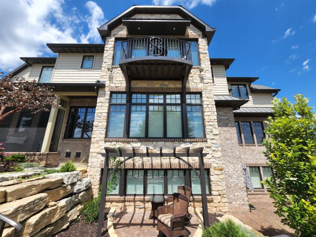 Home with grey walls and a balcony