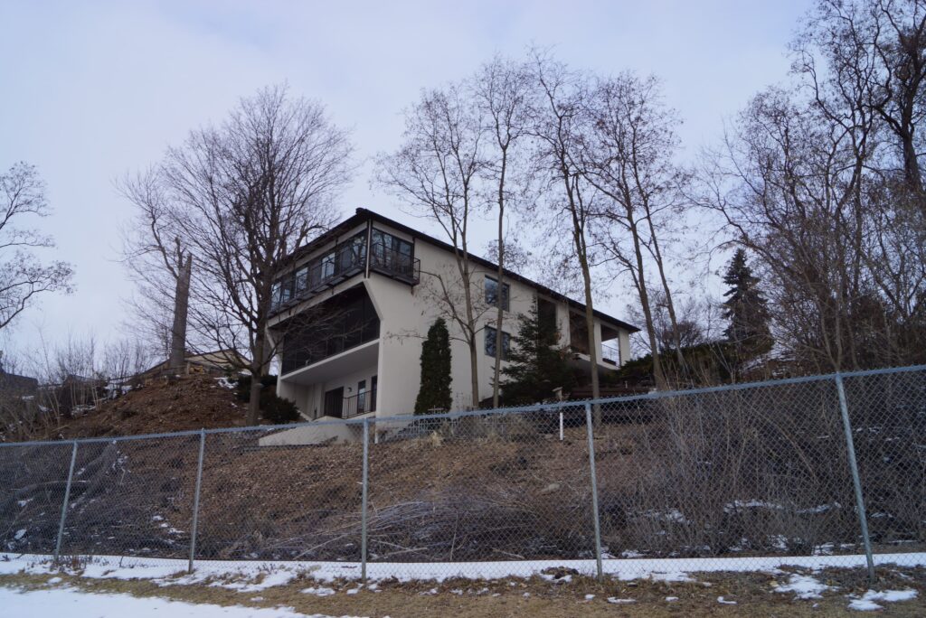 Home, tree, balcony and the sky