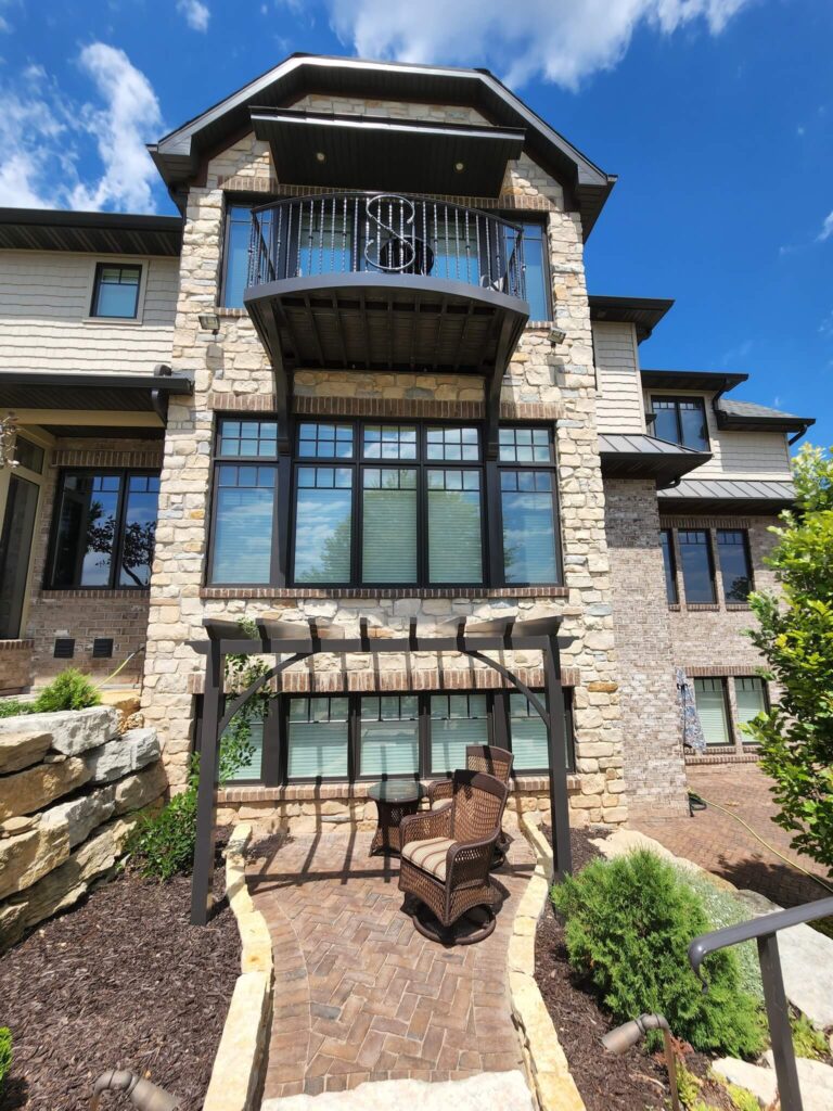Home with grey walls and a balcony