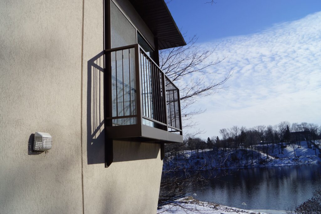 Home, tree, balcony and the sky