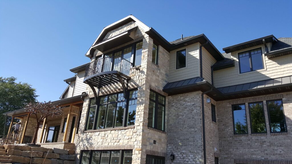 Home with grey walls and a balcony