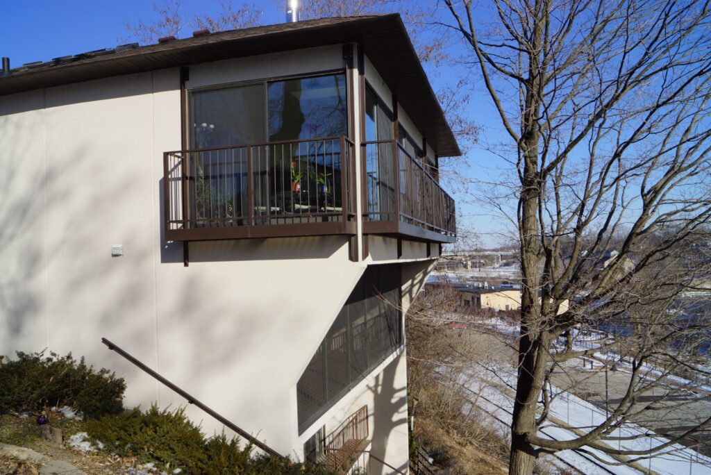 Home, tree, balcony and the sky