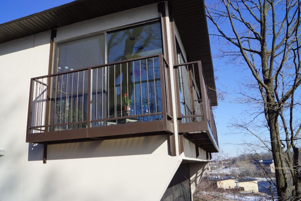 Home, tree, balcony and the sky