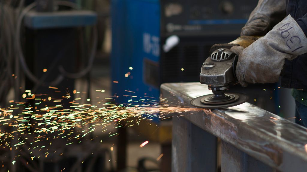 Man Grinding on Metal