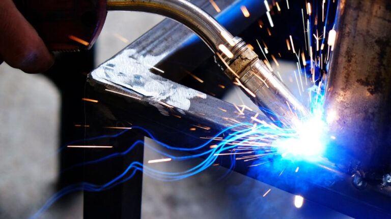 Close Up of a Welding Torch on Metal